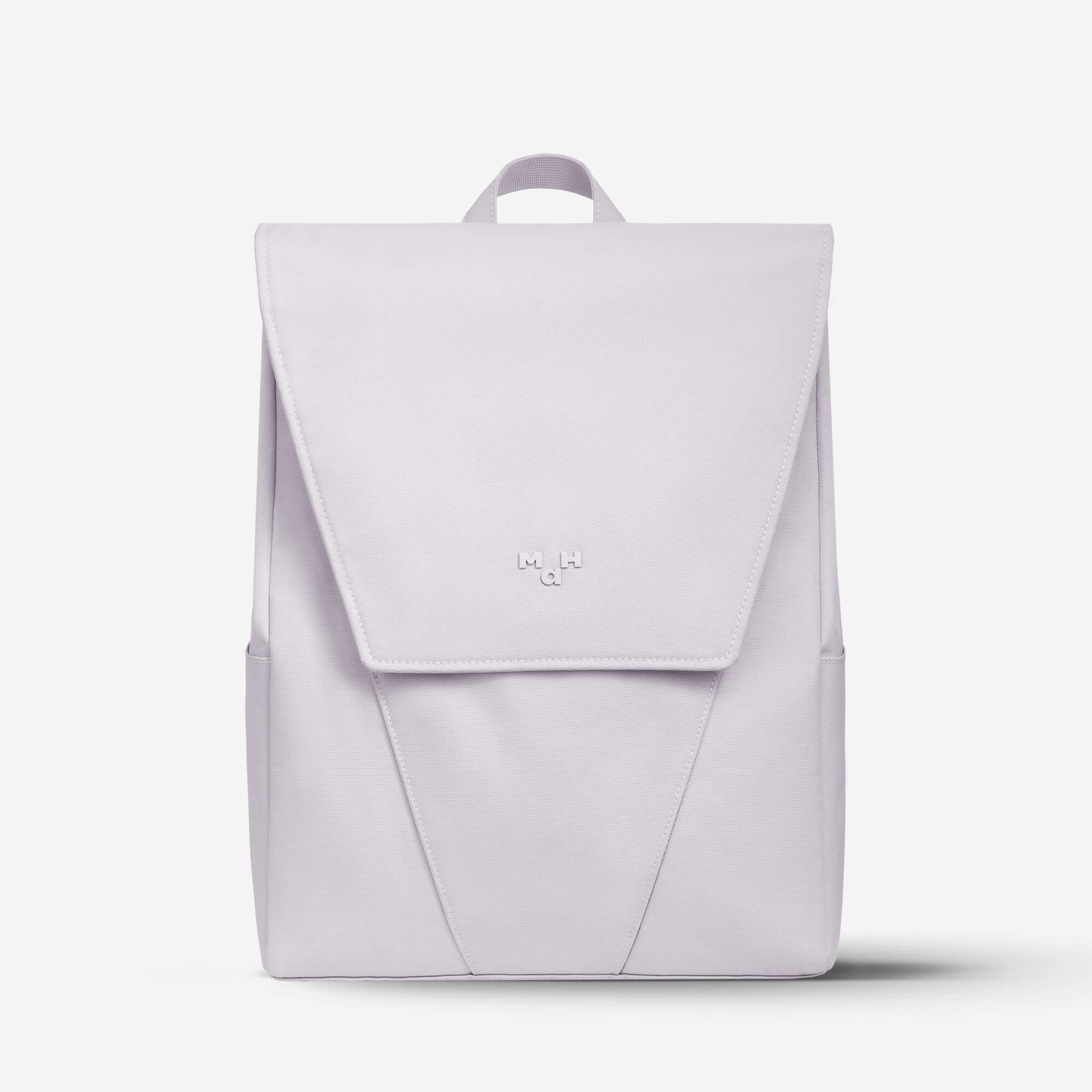 Light purple minimalist backpack with front flap and subtle logo, ideal for daily use or school