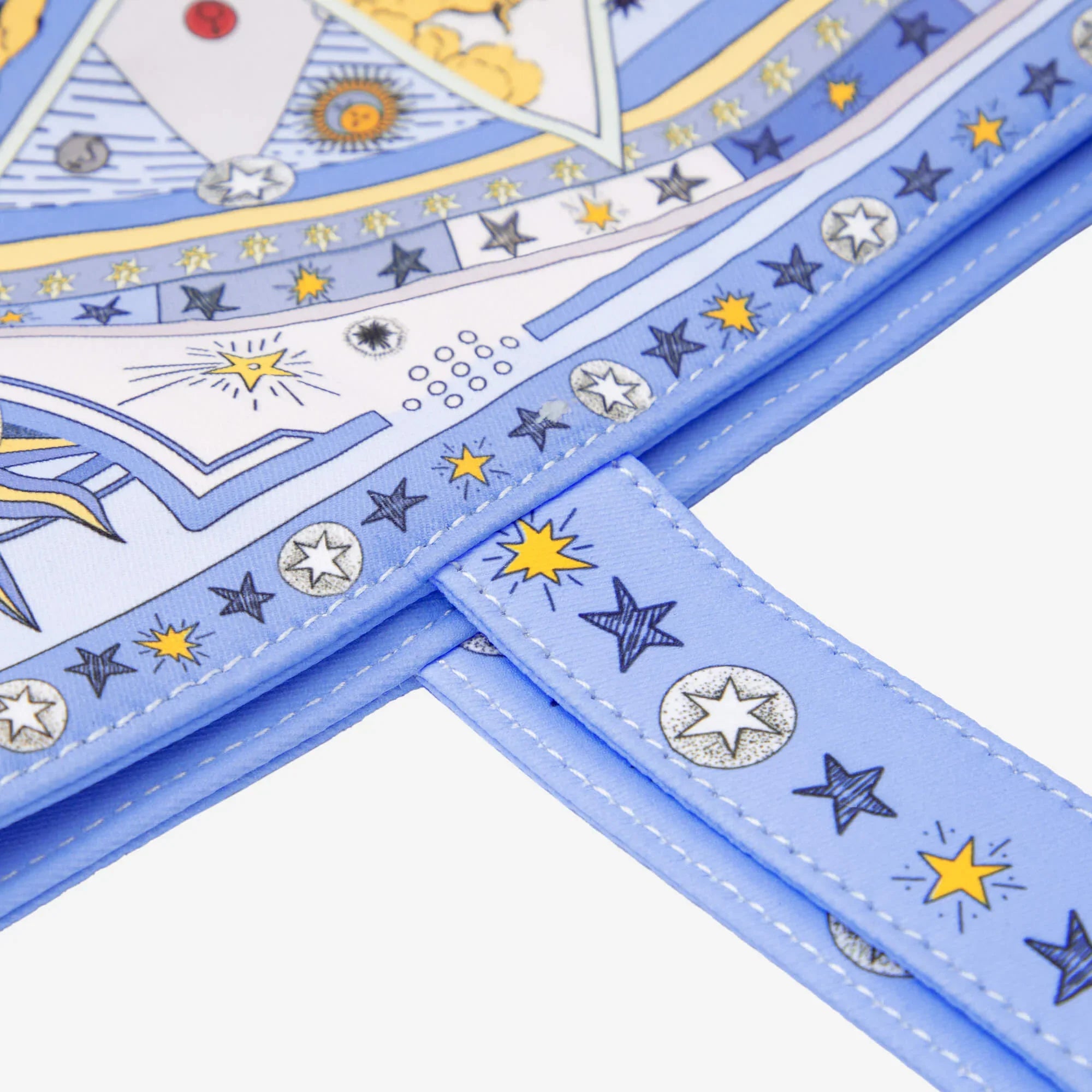 Blue backpack strap with star and celestial print, cosmic design detail