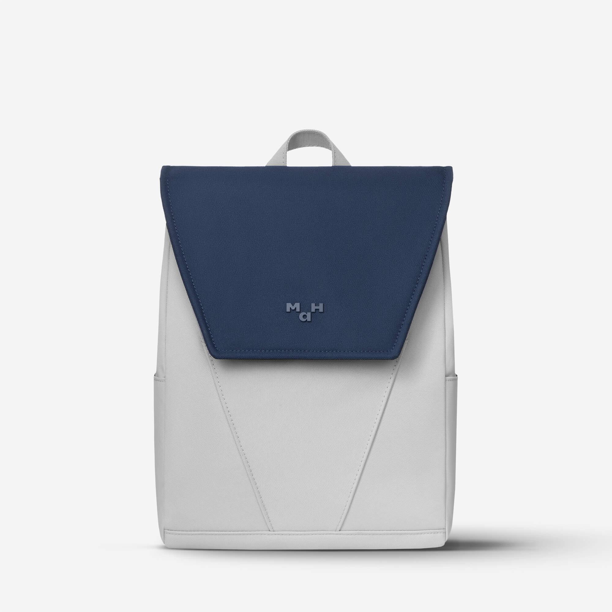 Modern navy and light gray backpack with minimalist design and front flap logo