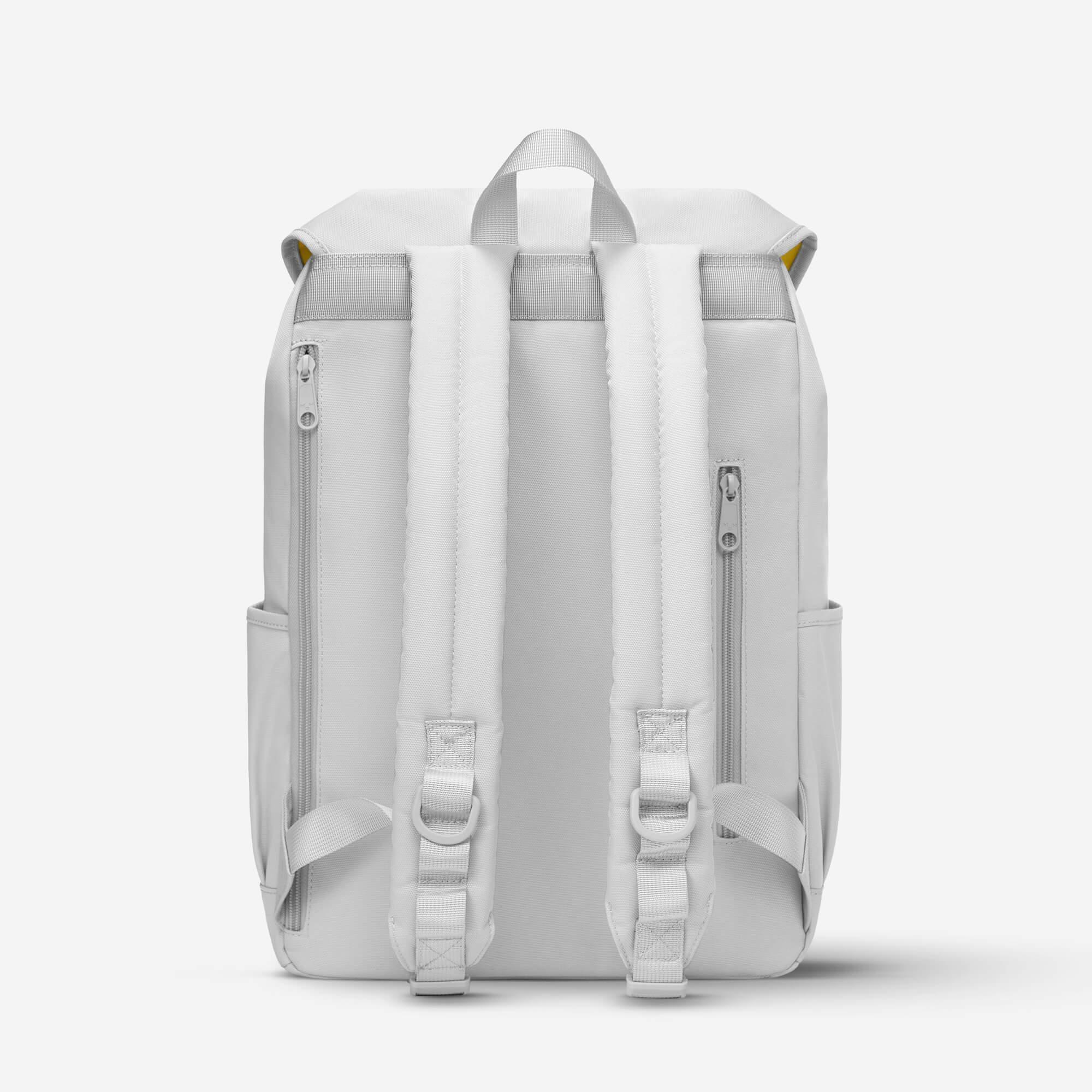 White backpack with padded straps and side zippers, minimalist design for daily use