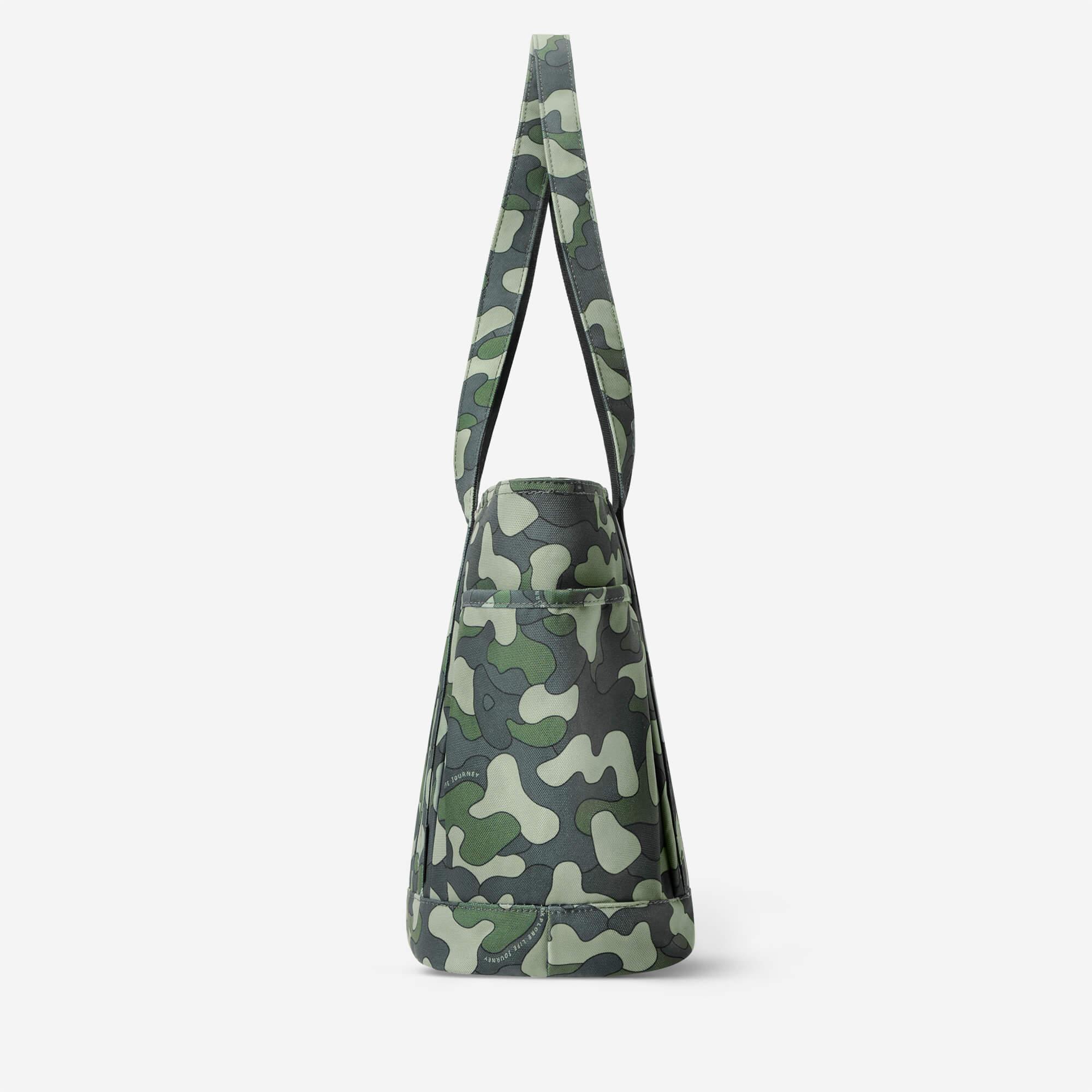 Green camouflage tote bag with long handles, stylish and functional design for everyday use.