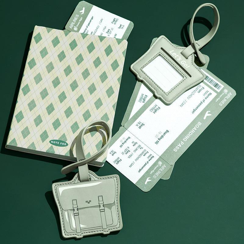Stylish luggage tags with boarding pass design, travel notebook, and bag charm for modern travelers