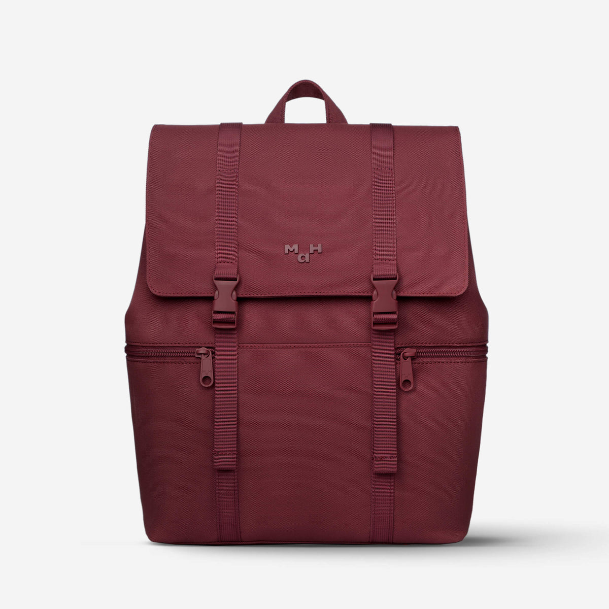 Burgundy backpack with front flap, buckles, and dual zippers, featuring minimalist design and durable fabric.