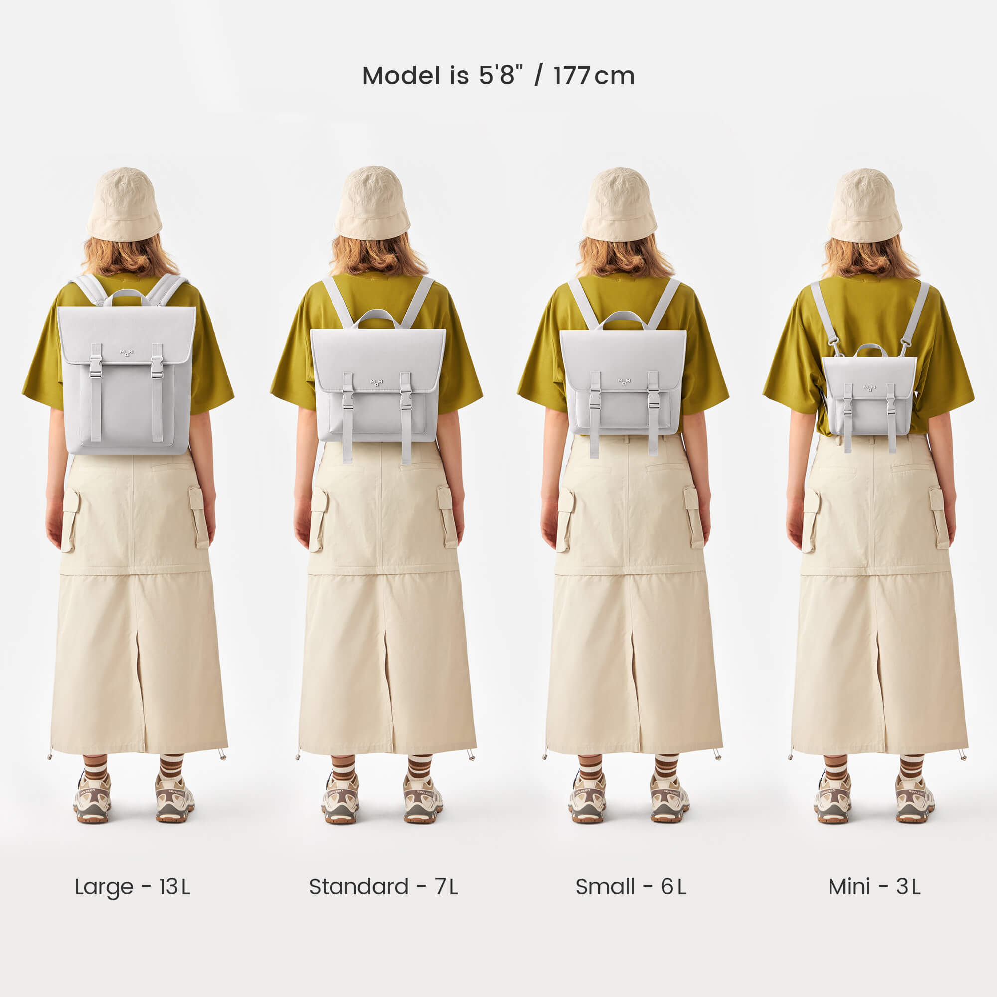Three sizes of minimalist white backpacks: Standard 7L, Small 6L, Mini 3L, worn by model in olive tee and beige skirt.