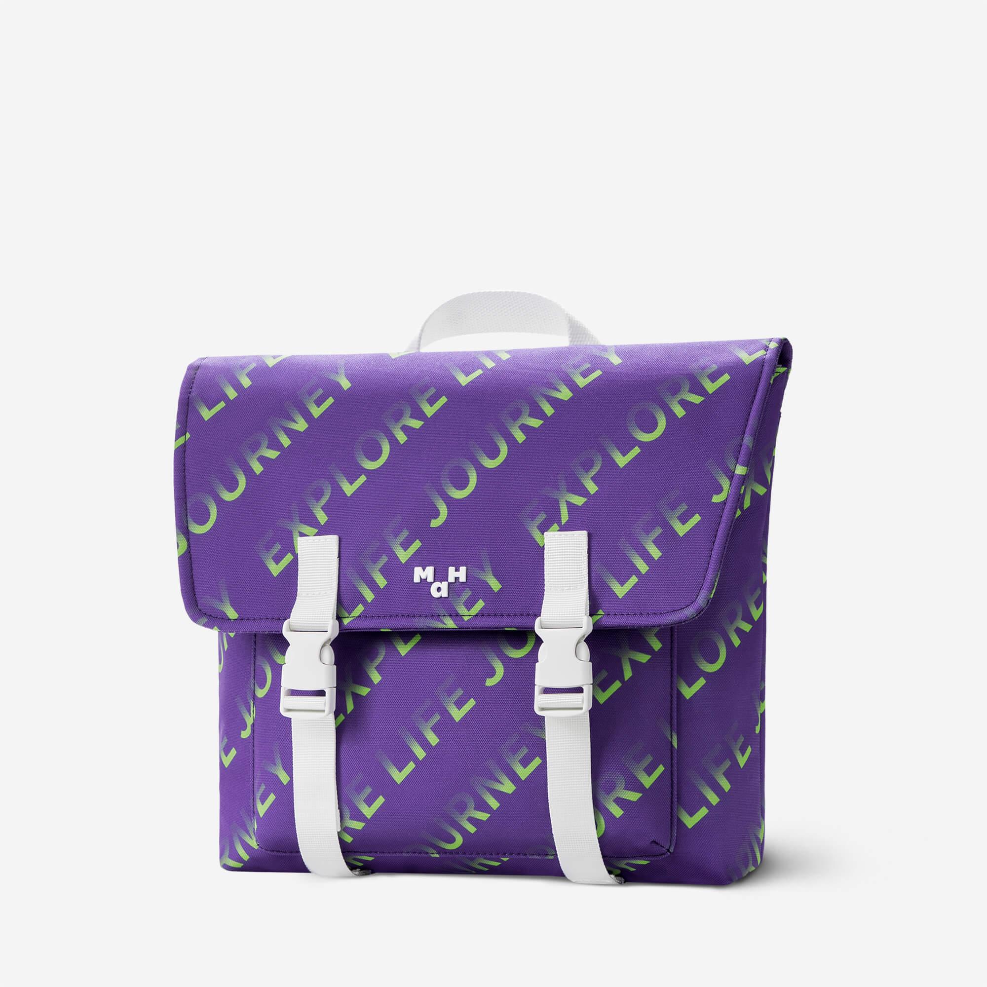 Purple backpack with green 'Explore Life Journey' print and white straps, stylish school or travel bag