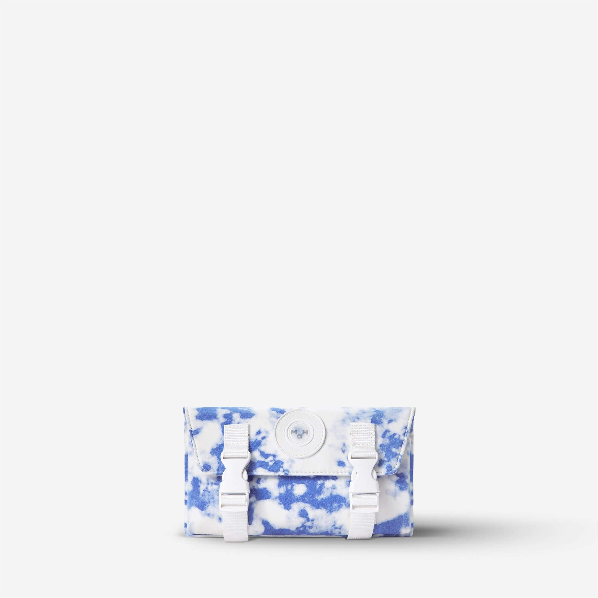 Blue and white tie-dye mini crossbody bag with white buckles and front logo