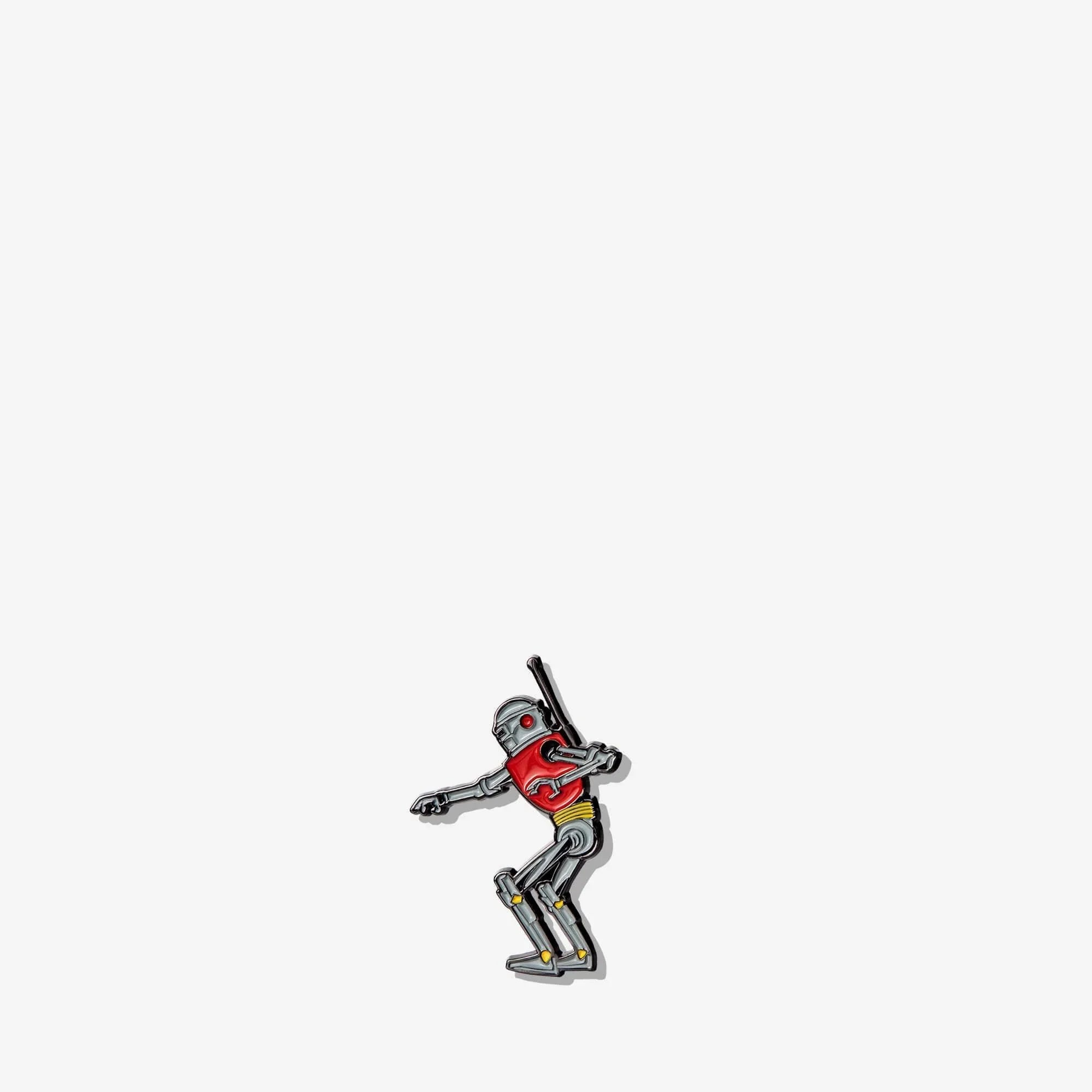 Robot enamel pin with red chest, silver body, and dynamic pose, ideal for backpacks and bags