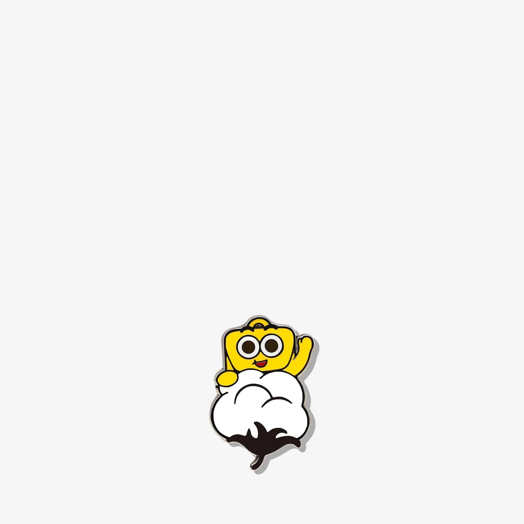 Cute yellow character enamel pin waving from a cotton boll, fun accessory for bags or jackets