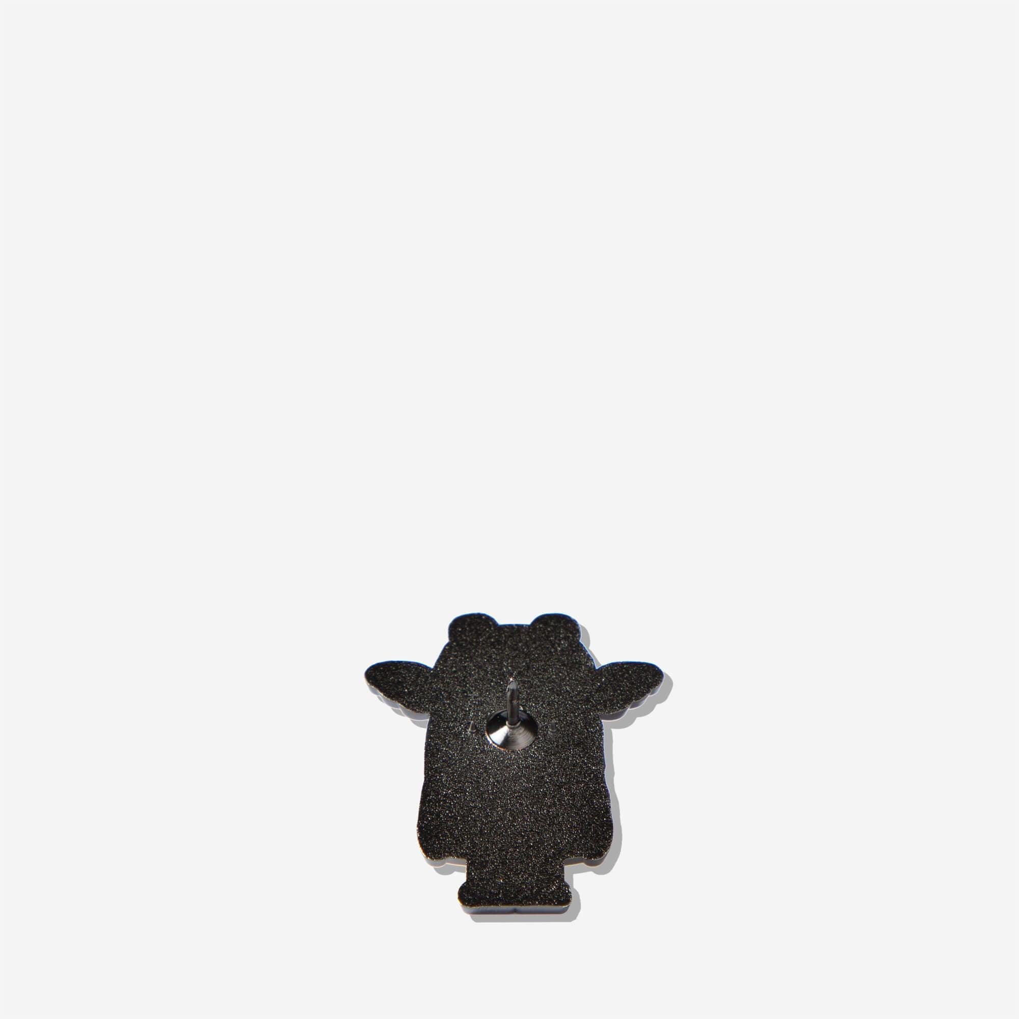 Black glitter bear-shaped pin with metal clasp, stylish accessory for bags or jackets