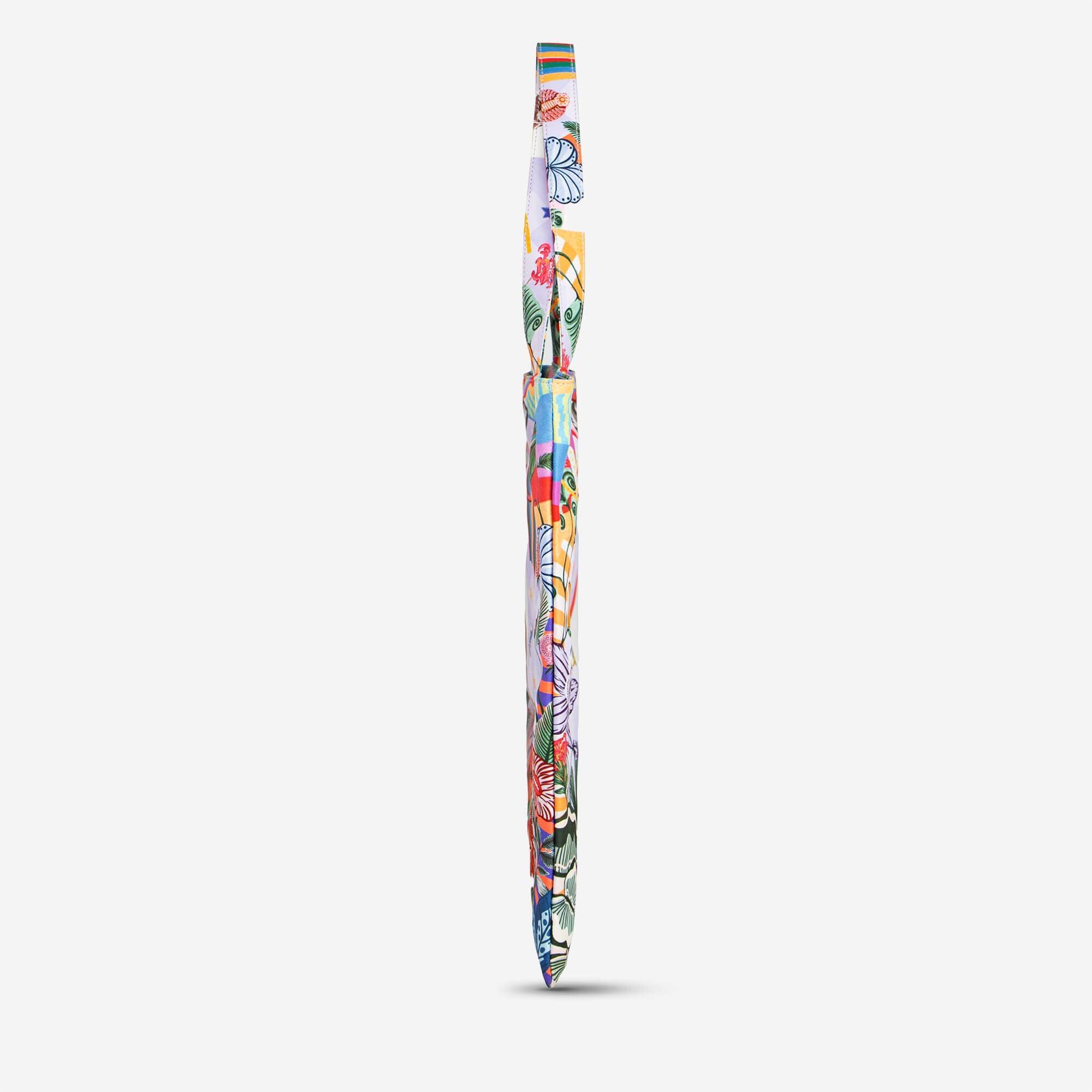 Colorful floral patterned laptop sleeve with vibrant tropical design and adjustable strap