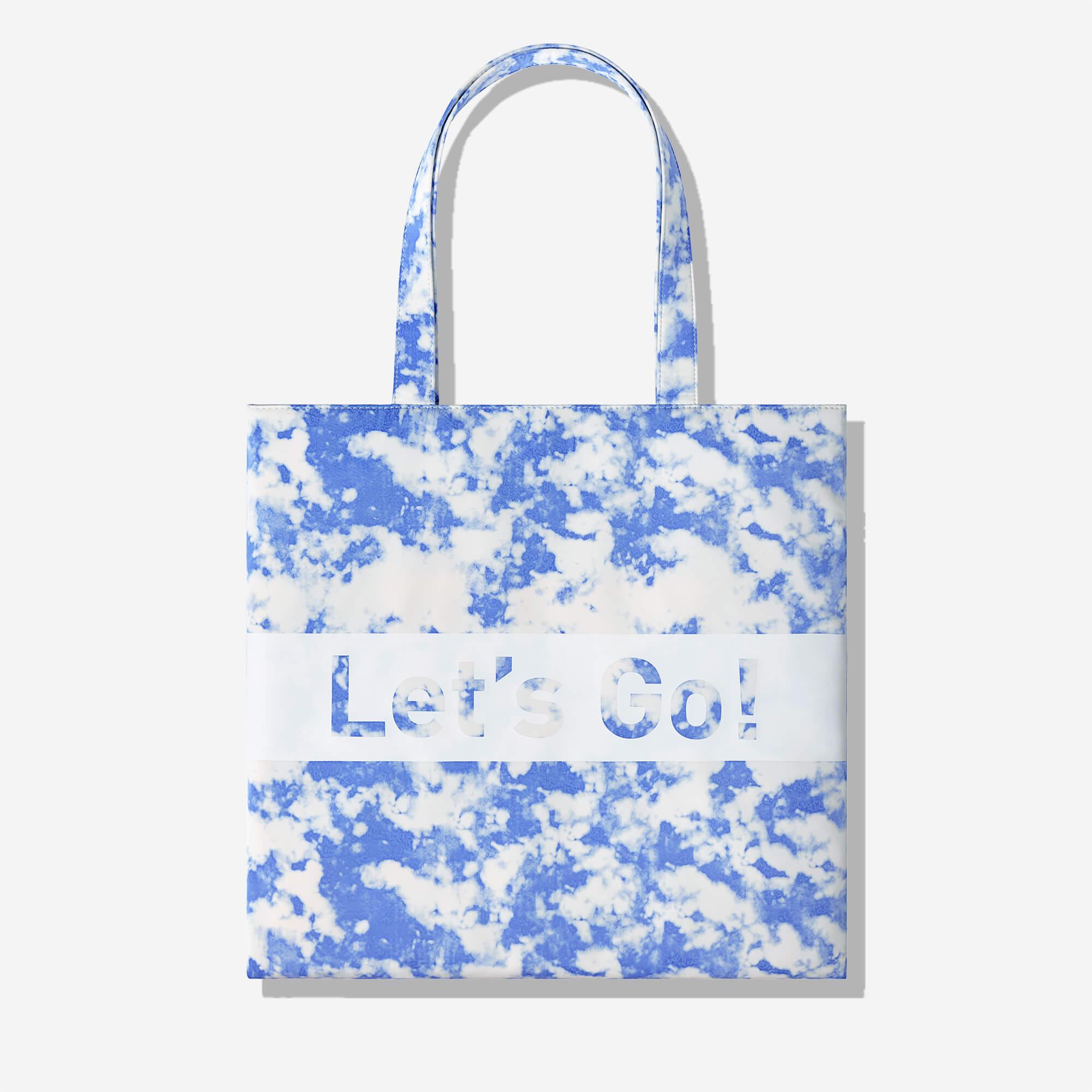 Blue and white cloud print tote bag with 'Let's Go!' text, stylish everyday carry accessory