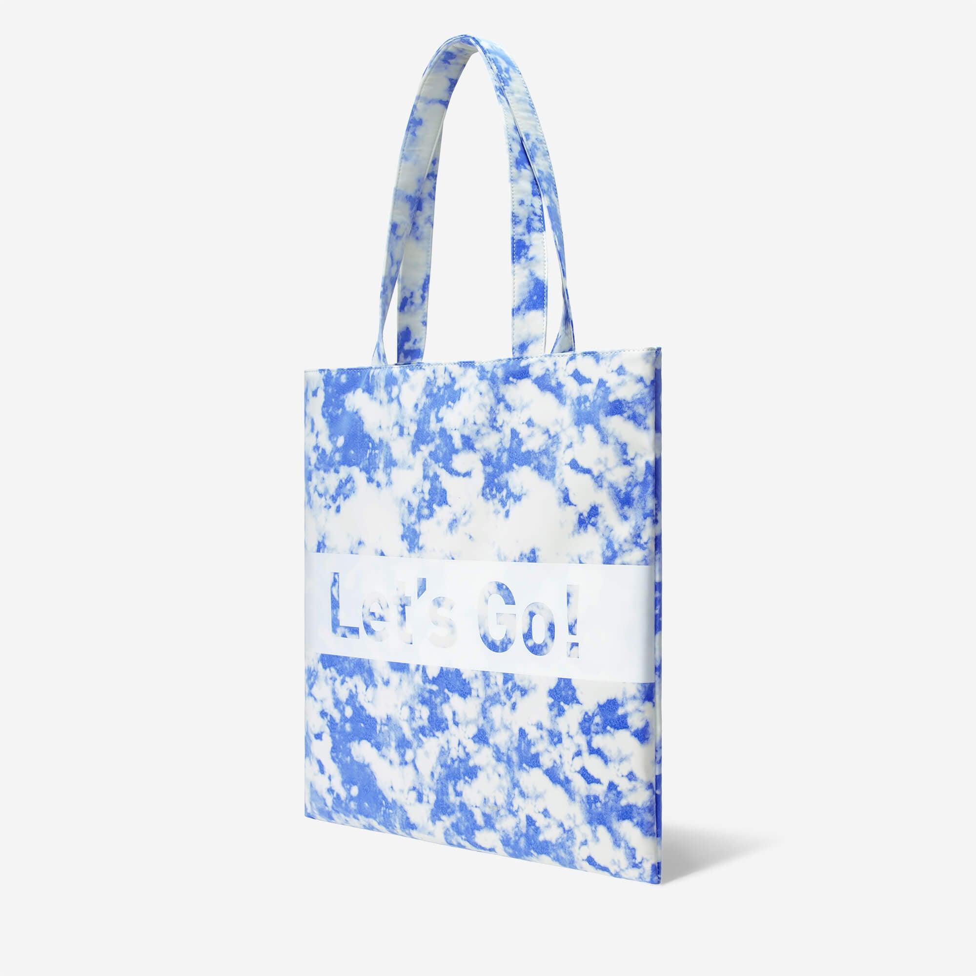 Blue and white tie-dye tote bag with 'Let's Go!' text, stylish everyday carry accessory