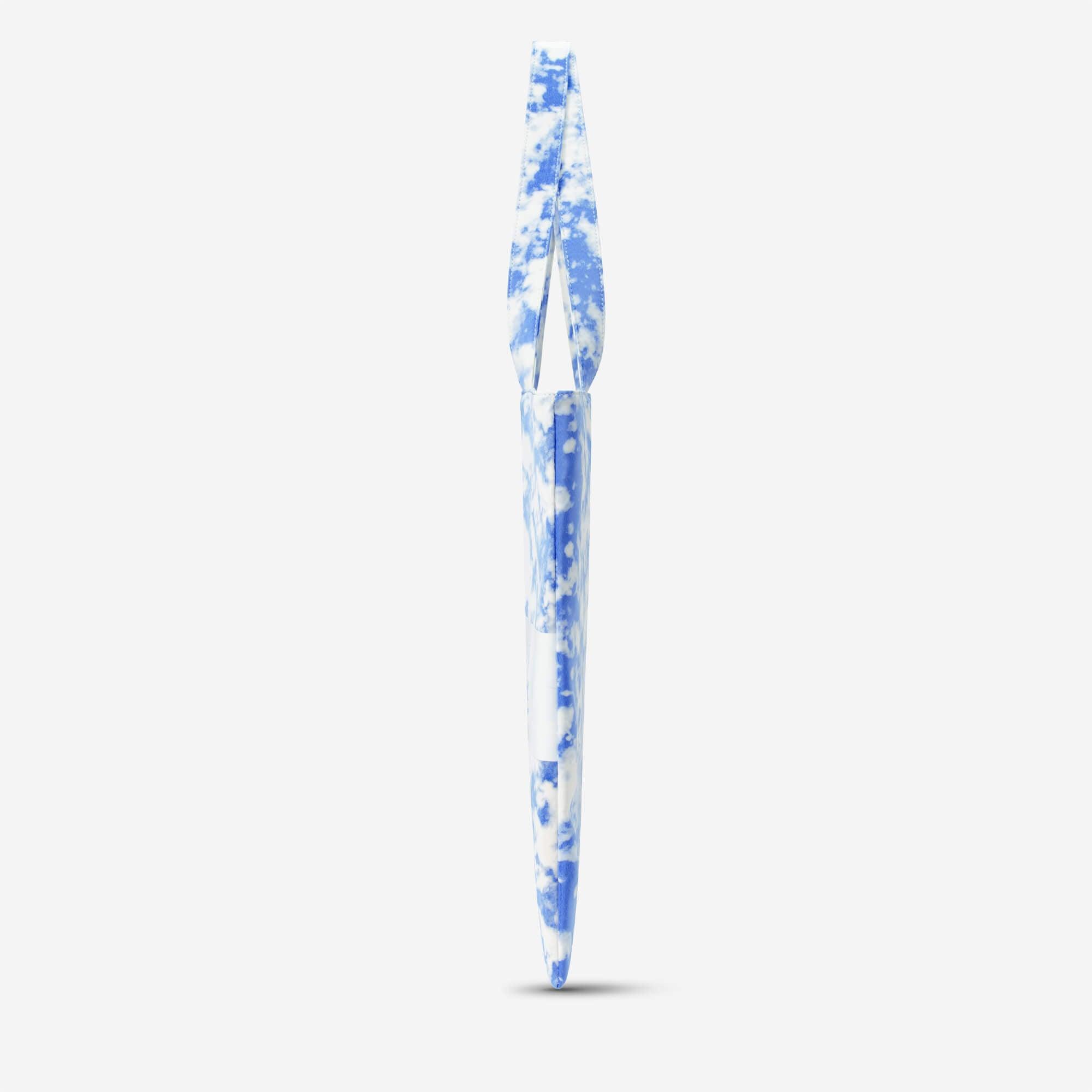Blue and white cloud print shoulder bag with long strap, stylish accessory for everyday use
