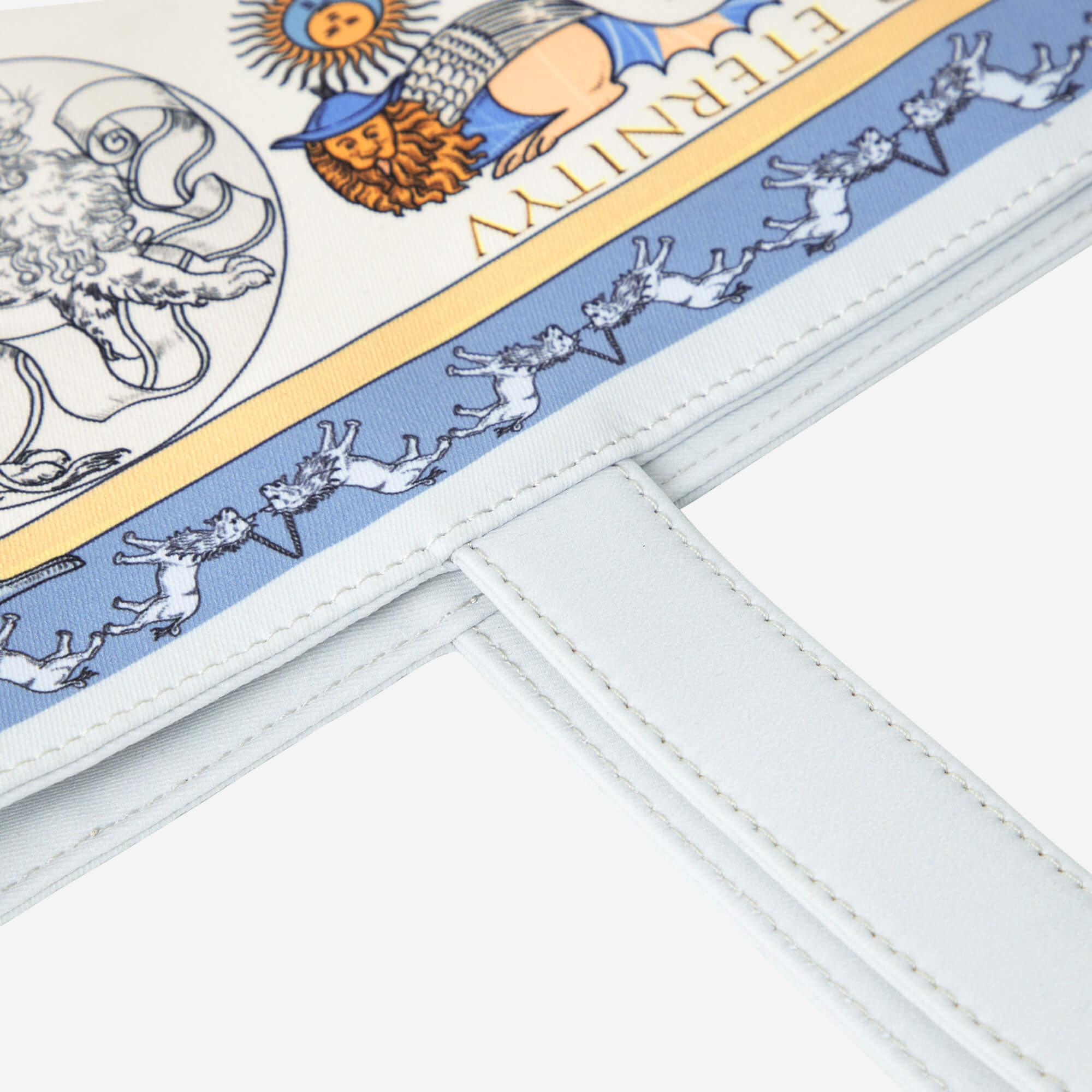 White bag with vintage Eternity print, mythical creatures, sun, and lion design, detailed stitching