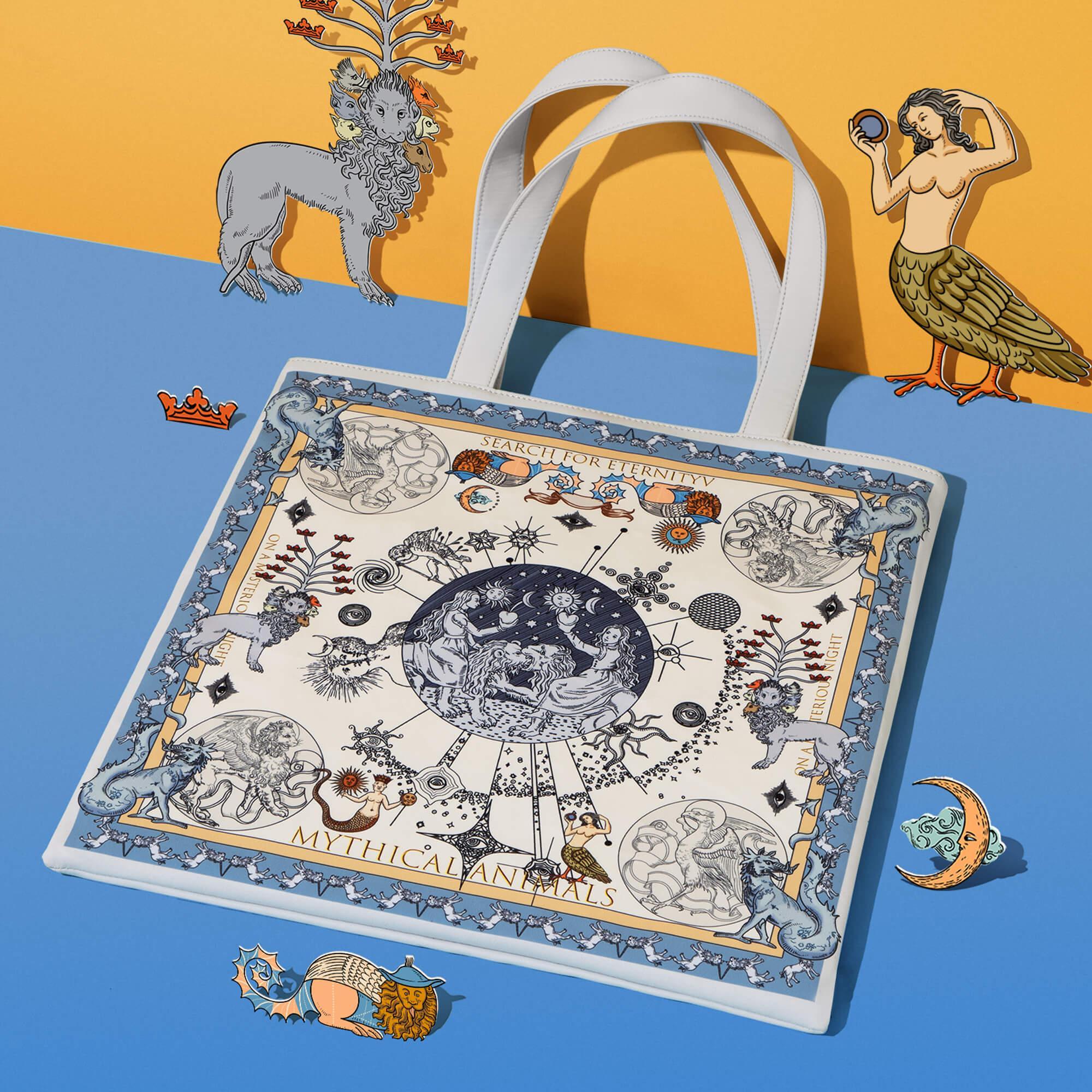 Mythical Animals tote bag with fantasy art, featuring lions, mermaids, and celestial designs on a blue and yellow background