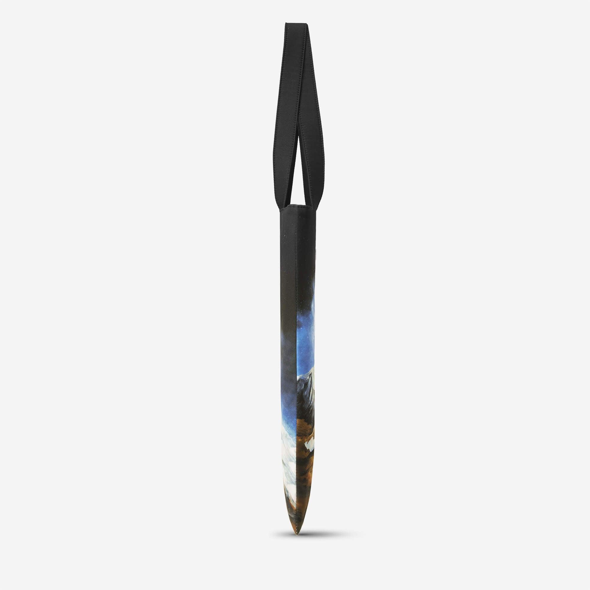 Slim shoulder bag with mountain landscape print and black strap, ideal for everyday carry