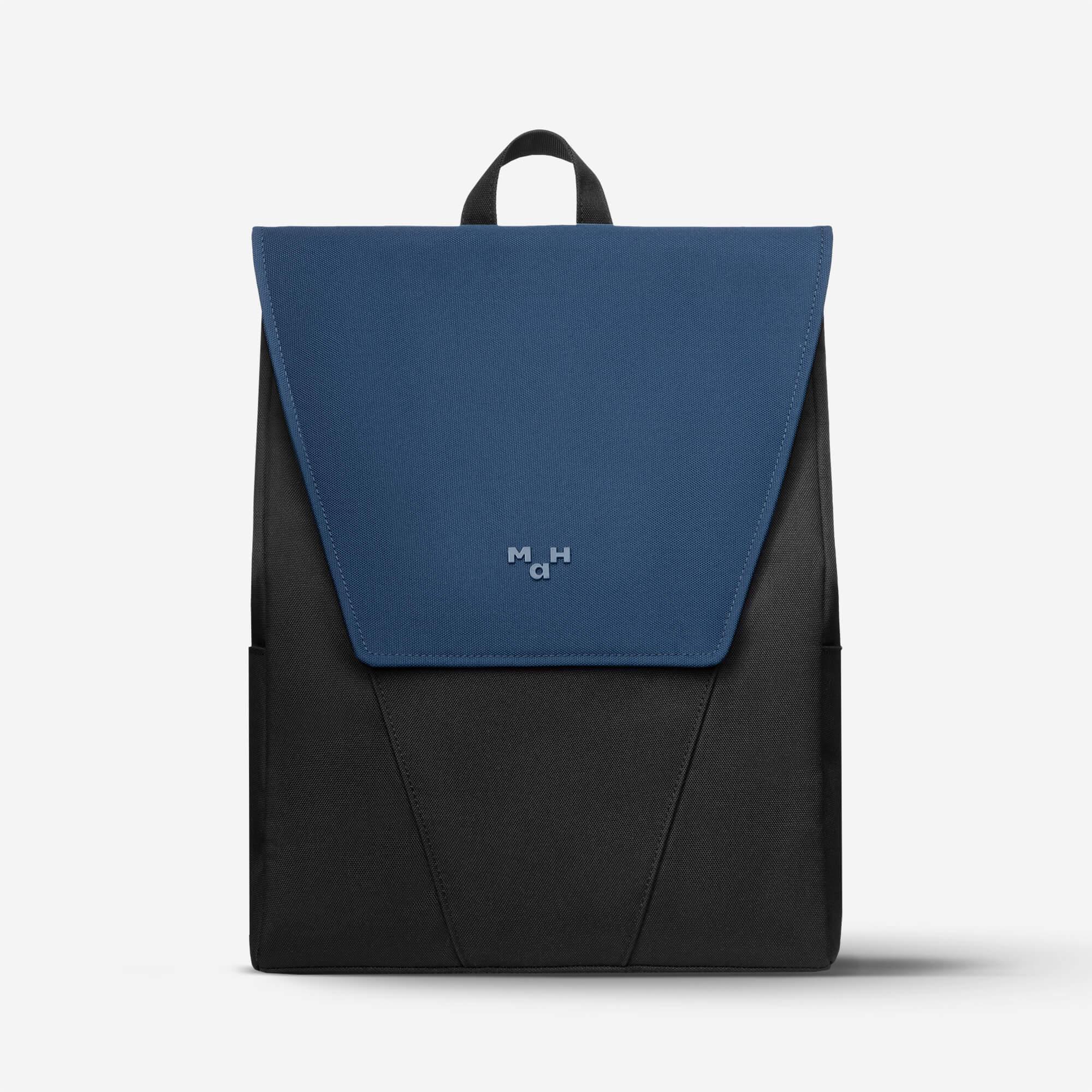 Blue and black minimalist backpack with flap closure and top handle, ideal for daily use or travel