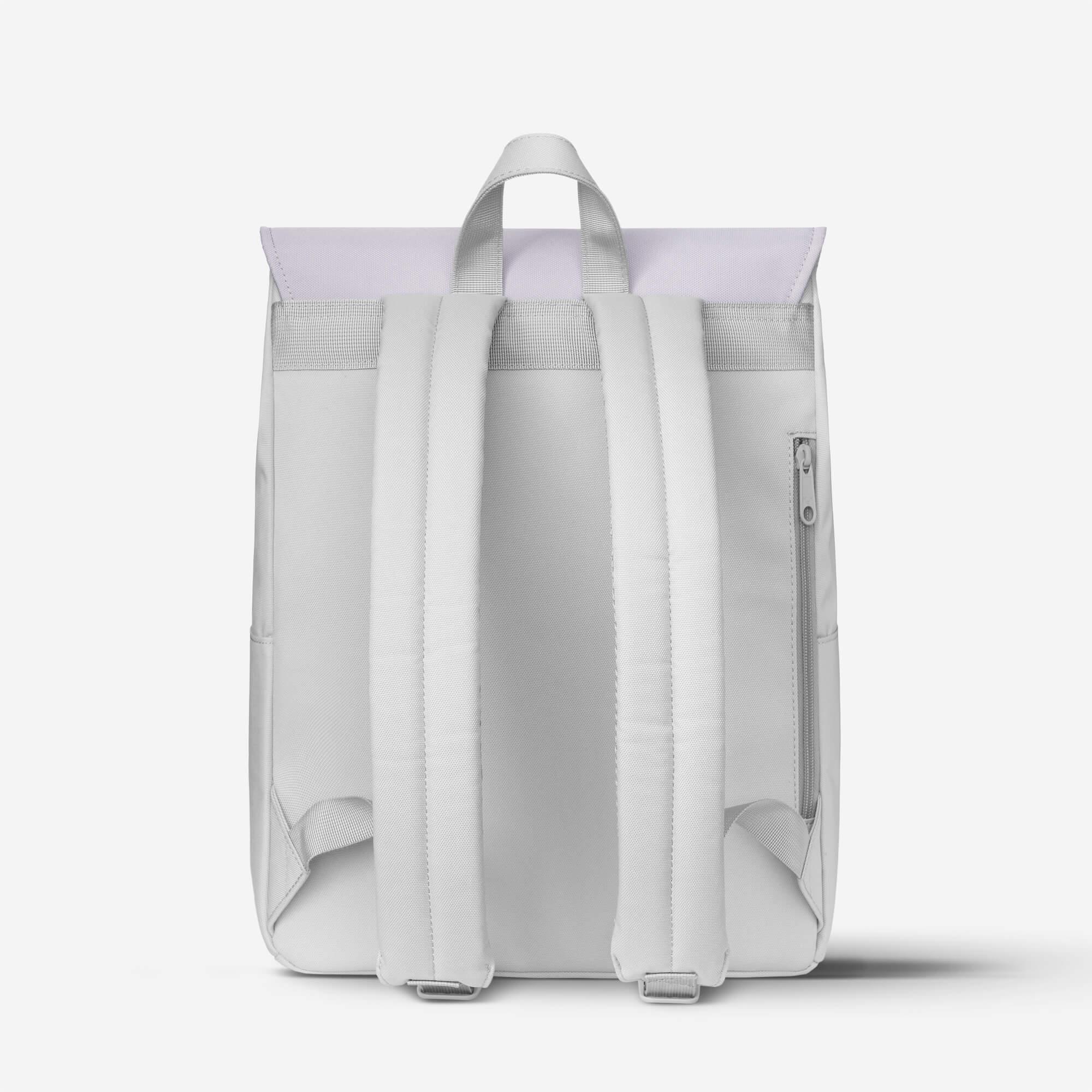 Light gray backpack with padded straps and side zipper pocket, minimalist design for daily use