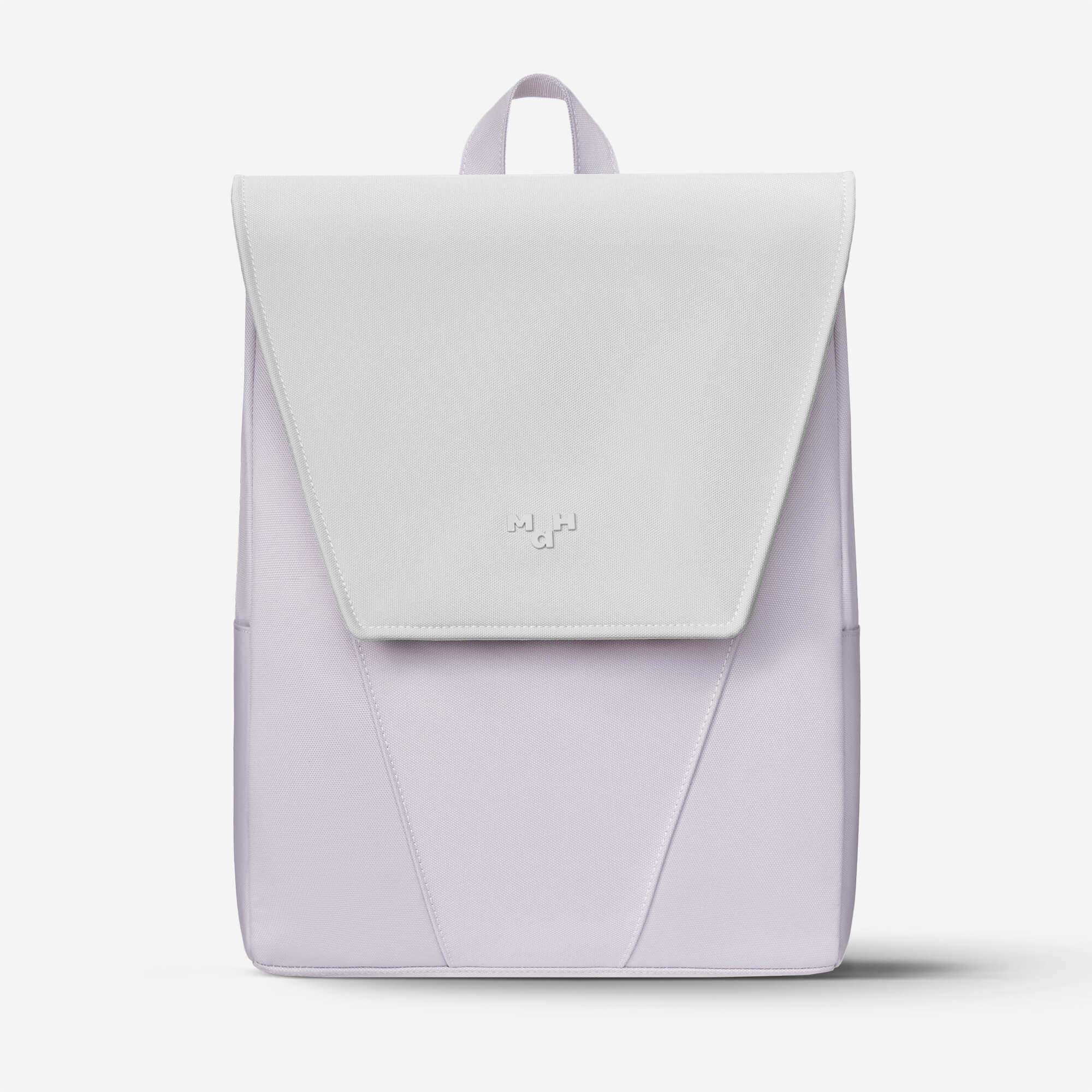 Minimalist lavender and white backpack with flap closure and subtle logo, ideal for daily use or travel