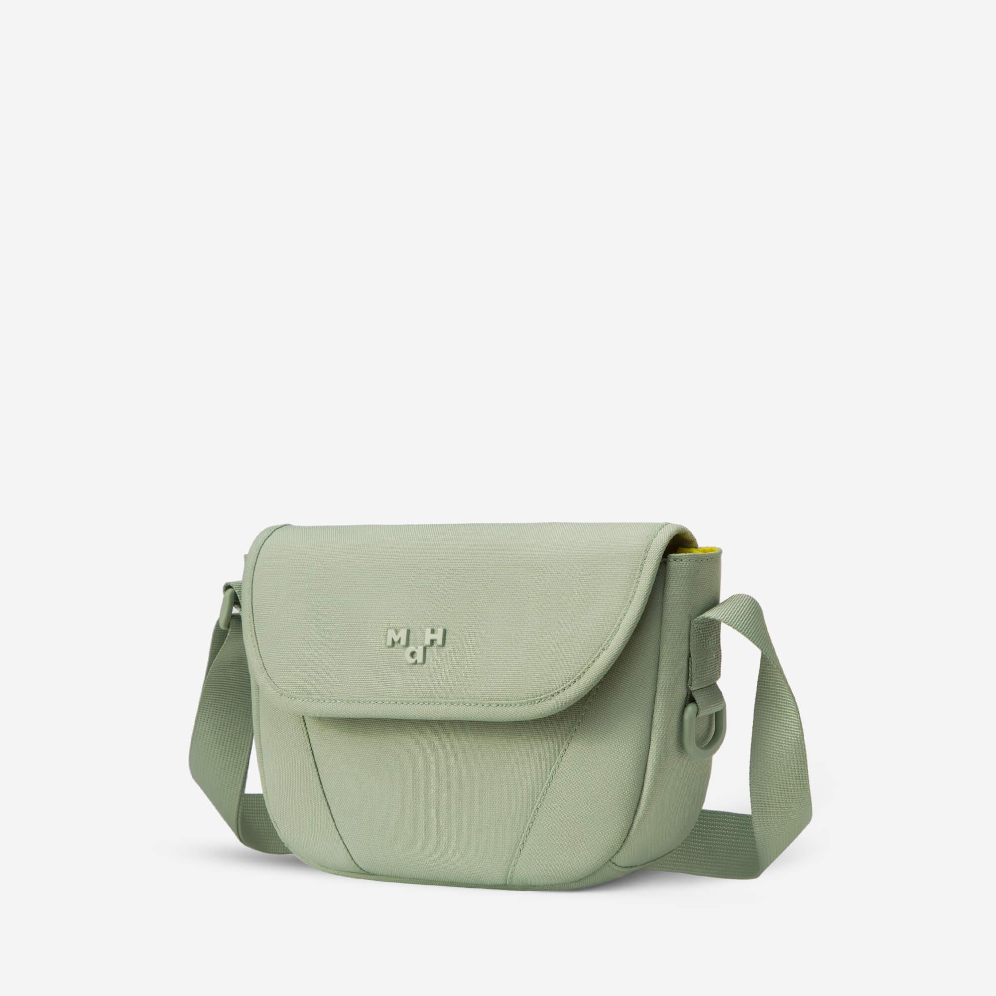 Sage green crossbody bag with adjustable strap and minimalist design, ideal for everyday use