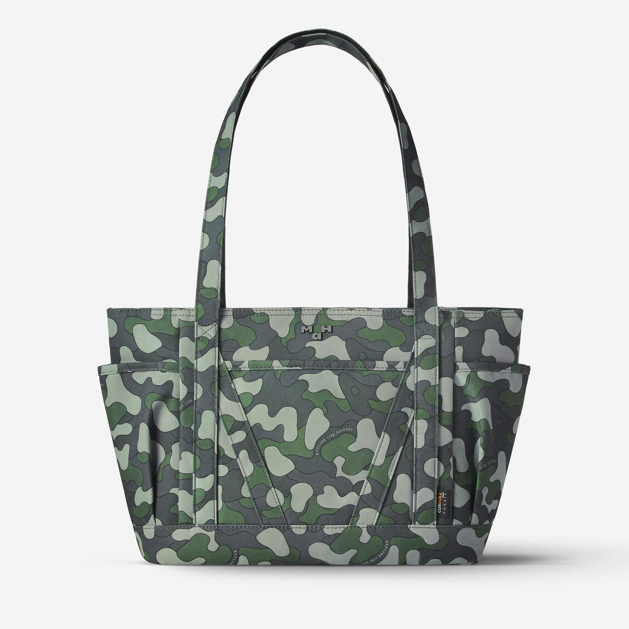 Camouflage tote bag with side pockets and durable Cordura fabric, ideal for everyday carry and travel.