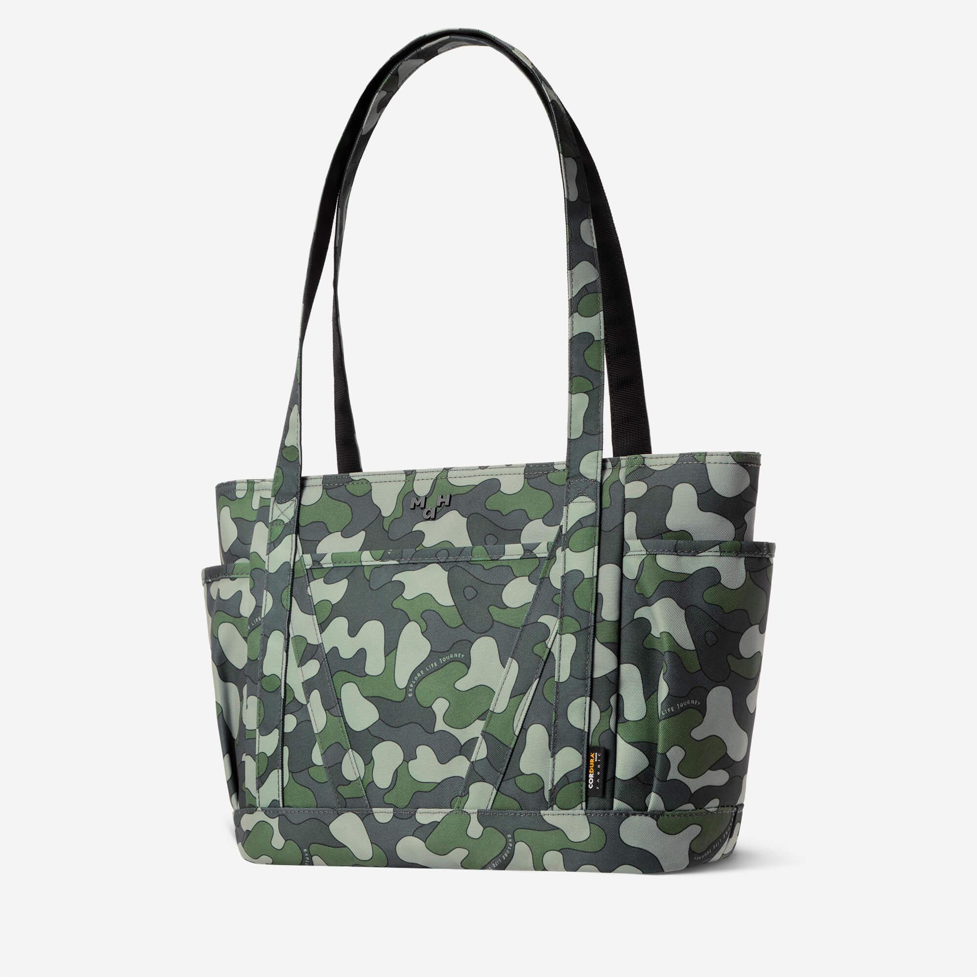 Camouflage tote bag with side pockets and durable Cordura fabric, ideal for everyday carry and travel.